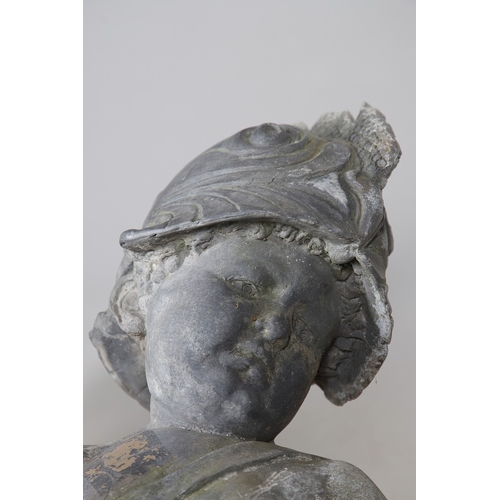 562 - A PAIR OF 19TH CENTURY LEAD GARDEN STATUES OF PUTTI. modelled wearing military style helmets, one wi... 