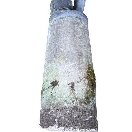 562 - A PAIR OF 19TH CENTURY LEAD GARDEN STATUES OF PUTTI. modelled wearing military style helmets, one wi... 