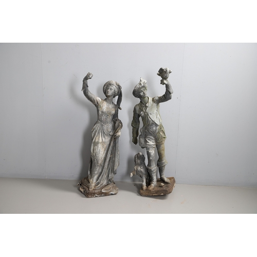 564 - A PAIR OF 19TH CENTURY LEAD GARDEN FIGURAL STATUES. possibly Lowlands, modelled as a Lady in her Med... 