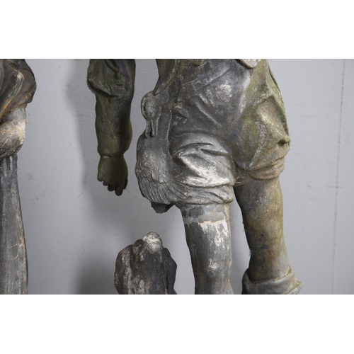 564 - A PAIR OF 19TH CENTURY LEAD GARDEN FIGURAL STATUES. possibly Lowlands, modelled as a Lady in her Med... 