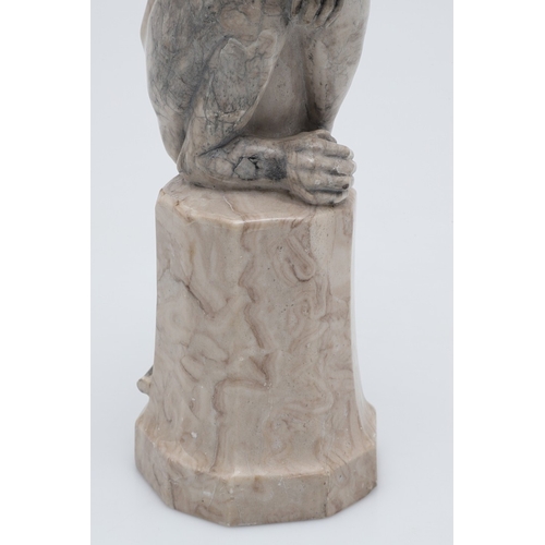585 - SIGNED MARBLE SCULPTURE OF A RHESUS MONKEY. In the manner of Wilhelm Krieger, a carved marble figure... 