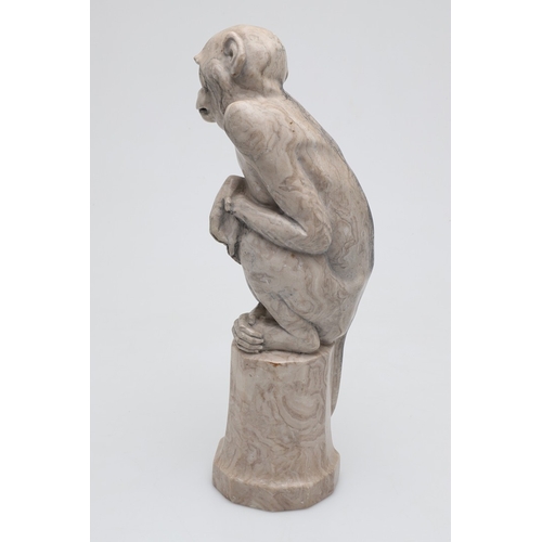 585 - SIGNED MARBLE SCULPTURE OF A RHESUS MONKEY. In the manner of Wilhelm Krieger, a carved marble figure... 