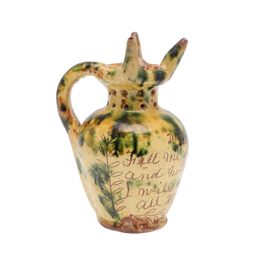 603 - DONYATT POTTERY PUZZLE JUG - 1896. A late 19thc Donyatt Pottery slipware puzzle jug, inscribed to 'W... 
