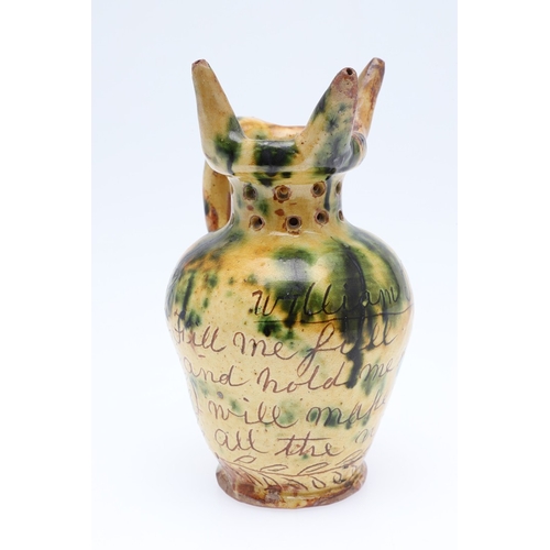 603 - DONYATT POTTERY PUZZLE JUG - 1896. A late 19thc Donyatt Pottery slipware puzzle jug, inscribed to 'W... 