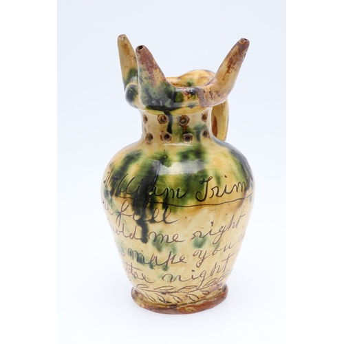 603 - DONYATT POTTERY PUZZLE JUG - 1896. A late 19thc Donyatt Pottery slipware puzzle jug, inscribed to 'W... 