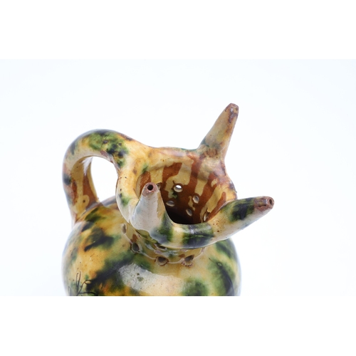 603 - DONYATT POTTERY PUZZLE JUG - 1896. A late 19thc Donyatt Pottery slipware puzzle jug, inscribed to 'W... 