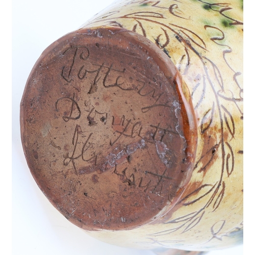 603 - DONYATT POTTERY PUZZLE JUG - 1896. A late 19thc Donyatt Pottery slipware puzzle jug, inscribed to 'W... 