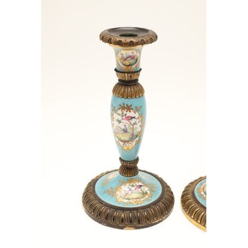 619 - PAIR OF FRENCH 19THC PORCELAIN & GILT METAL CANDLESTICKS. The porcelain sections painted with flower... 