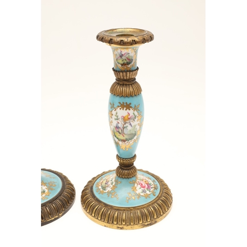 619 - PAIR OF FRENCH 19THC PORCELAIN & GILT METAL CANDLESTICKS. The porcelain sections painted with flower... 