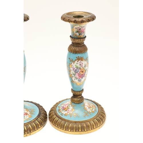 619 - PAIR OF FRENCH 19THC PORCELAIN & GILT METAL CANDLESTICKS. The porcelain sections painted with flower... 