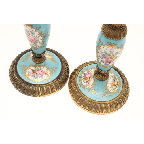 619 - PAIR OF FRENCH 19THC PORCELAIN & GILT METAL CANDLESTICKS. The porcelain sections painted with flower... 