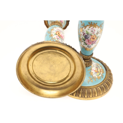 619 - PAIR OF FRENCH 19THC PORCELAIN & GILT METAL CANDLESTICKS. The porcelain sections painted with flower... 