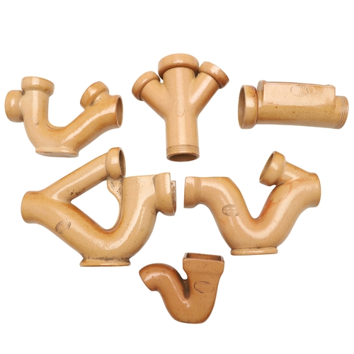 624 - UNUSUAL DOULTON LAMBETH TRADESMAN SAMPLES. An interesting collection of stoneware miniature pipes, m... 