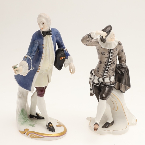 634 - NYMPHENBURG PORCELAIN FIGURES. Including two similar figures with one holding a fan (18cms high), an... 