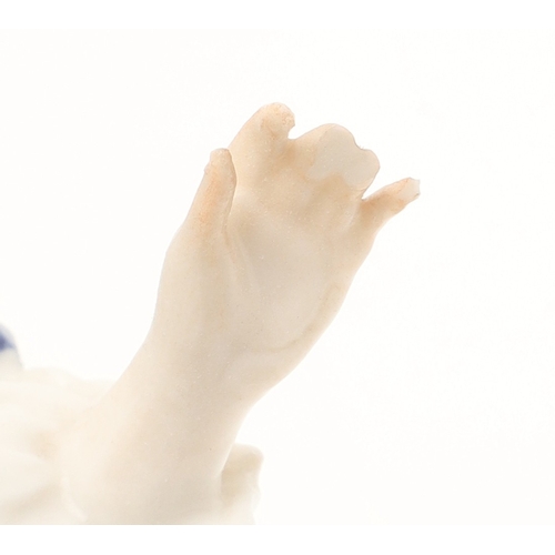 634 - NYMPHENBURG PORCELAIN FIGURES. Including two similar figures with one holding a fan (18cms high), an... 