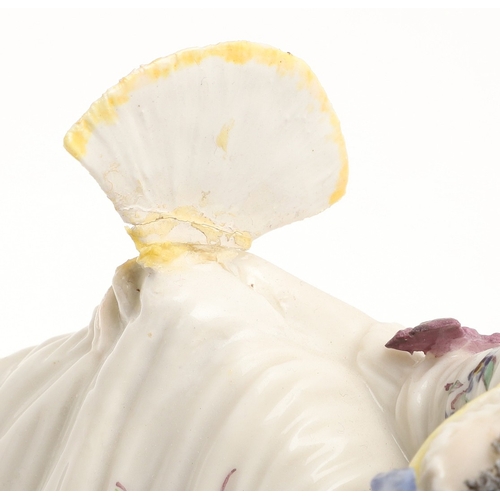 634 - NYMPHENBURG PORCELAIN FIGURES. Including two similar figures with one holding a fan (18cms high), an... 