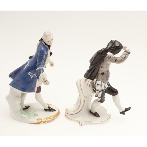 634 - NYMPHENBURG PORCELAIN FIGURES. Including two similar figures with one holding a fan (18cms high), an... 