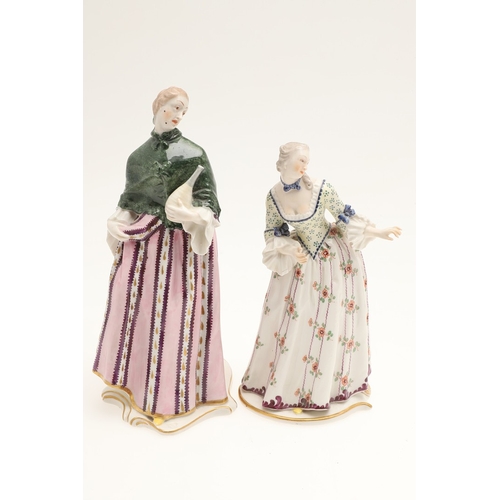 634 - NYMPHENBURG PORCELAIN FIGURES. Including two similar figures with one holding a fan (18cms high), an... 