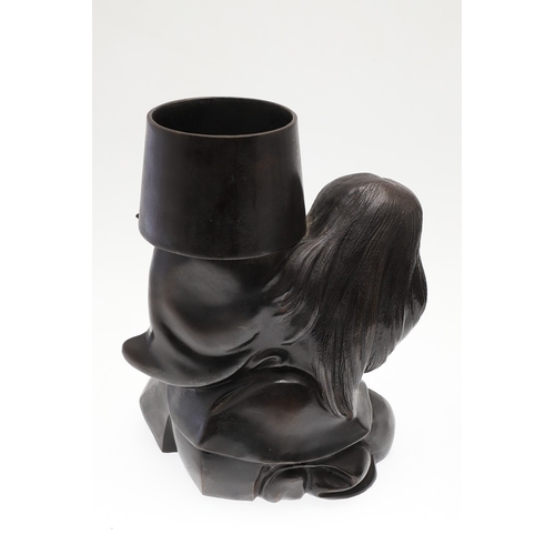 666 - JAPANESE BRONZE FIGURAL STAND. A bronze circular top stand made in two sections, supported by a figu... 