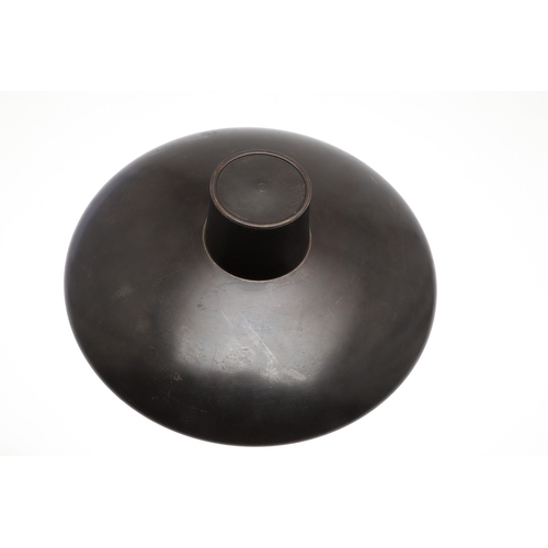 666 - JAPANESE BRONZE FIGURAL STAND. A bronze circular top stand made in two sections, supported by a figu... 