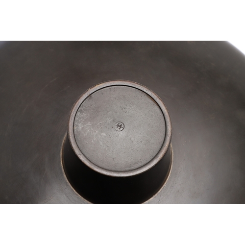 666 - JAPANESE BRONZE FIGURAL STAND. A bronze circular top stand made in two sections, supported by a figu... 