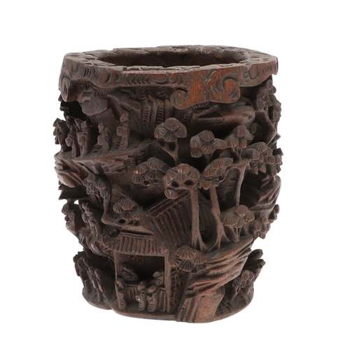 676 - CHINESE BAMBOO BRUSH POT. 19thc, of circular form and carved with a variety of figures amongst trees... 