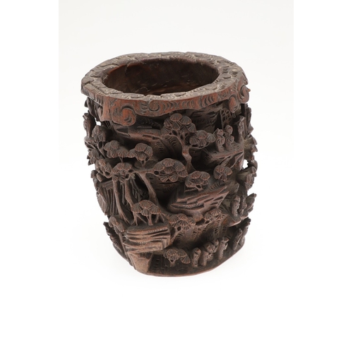 676 - CHINESE BAMBOO BRUSH POT. 19thc, of circular form and carved with a variety of figures amongst trees... 