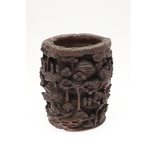 676 - CHINESE BAMBOO BRUSH POT. 19thc, of circular form and carved with a variety of figures amongst trees... 