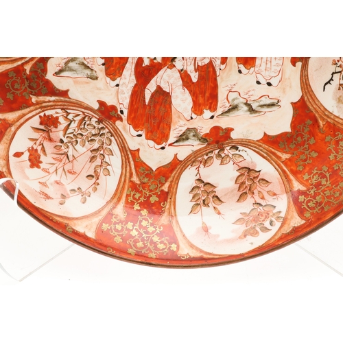 683 - JAPANESE KUTANI CHARGER. Painted to the centre with various scholars by a tree in blossom, also pain... 