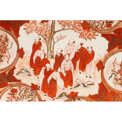 683 - JAPANESE KUTANI CHARGER. Painted to the centre with various scholars by a tree in blossom, also pain... 