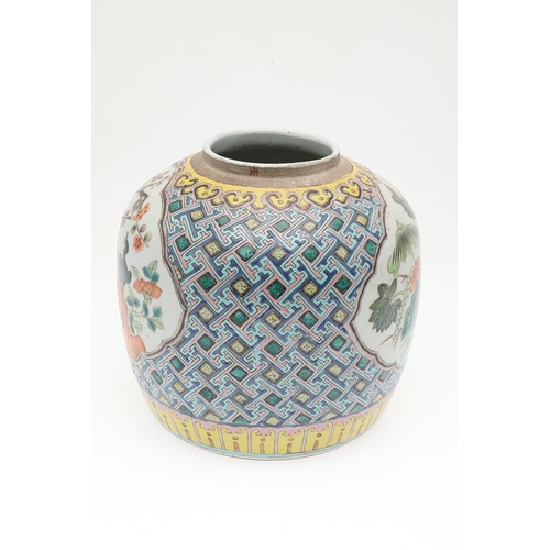 687 - CHINESE FAMILLE VERTE GINGER JAR. Probably late 19thc, with shaped panels on each side painted with ... 