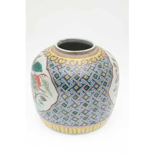 687 - CHINESE FAMILLE VERTE GINGER JAR. Probably late 19thc, with shaped panels on each side painted with ... 