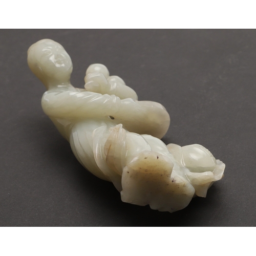 688 - SMALL CHINESE JADE FIGURE. 20thc, a celadon jade figure of a lady, holding fruit in one hand and a b... 