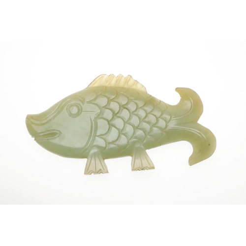 700 - CHINESE JADE FISH. Late Qing, the celadon jade fish of narrow form and with carved detailing. With a... 