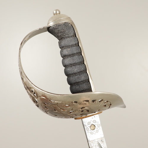 101 - A GEORGE V 1897 PATTERN SWORD AND SCABBARD. An 1897 Pattern Infantry Officers sword with an 82 cm po... 