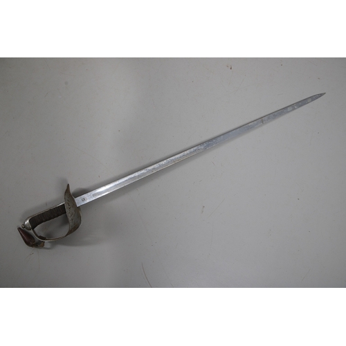 104 - A GEORGE V 1897 PATTERN SWORD. An 1897 Pattern Infantry Officers sword with an 83 cm pointed unsharp... 