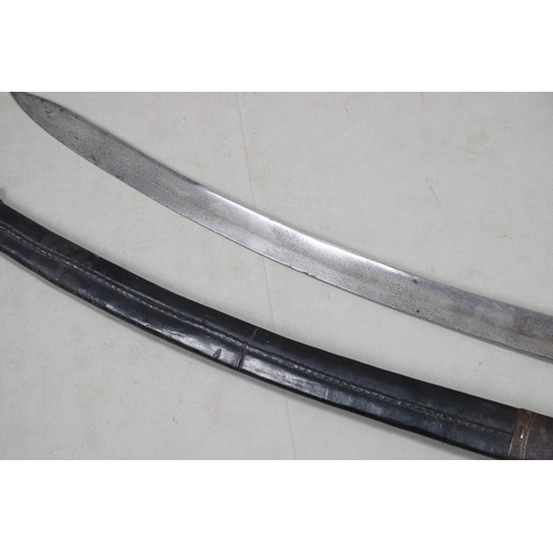 106 - A NINETEENTH CENTURY BRITISH POLICE OFFICER'S SWORD AND SCABBARD. With a 58 cm curved blade with poi... 