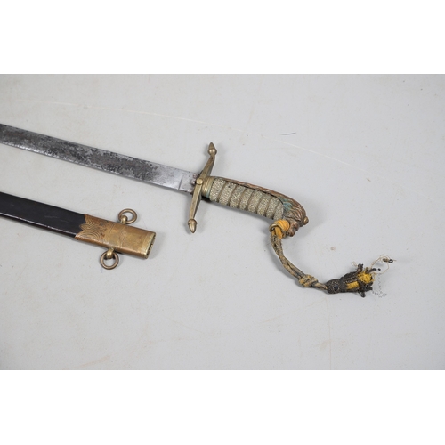 109 - A VICTORIAN MIDSHIPMAN'S DIRK AND SCABBARD. With a 44 cm straight, pointed unfullered blade, the cro... 