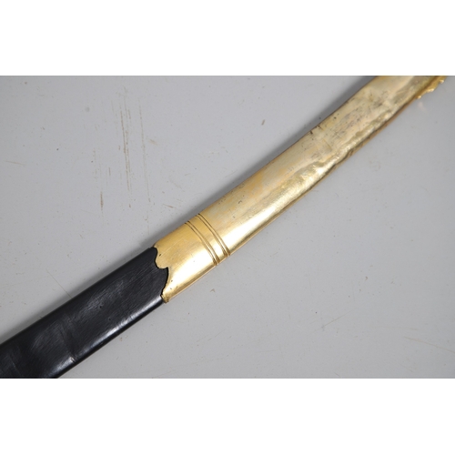 111 - A FRENCH NAPOLEONIC PERIOD INFANTRY OFFICER'S SWORD AND SCABBARD. With a 72 cm curved blade with poi... 