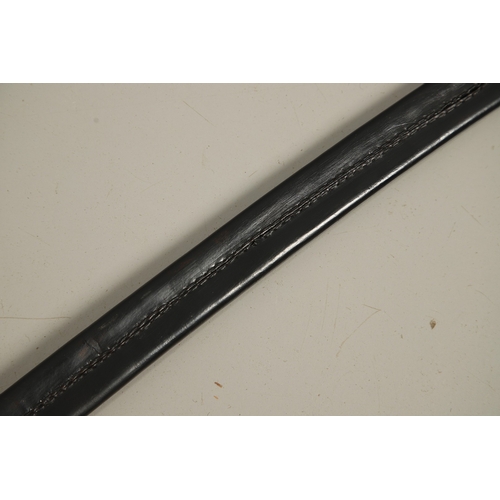 111 - A FRENCH NAPOLEONIC PERIOD INFANTRY OFFICER'S SWORD AND SCABBARD. With a 72 cm curved blade with poi... 