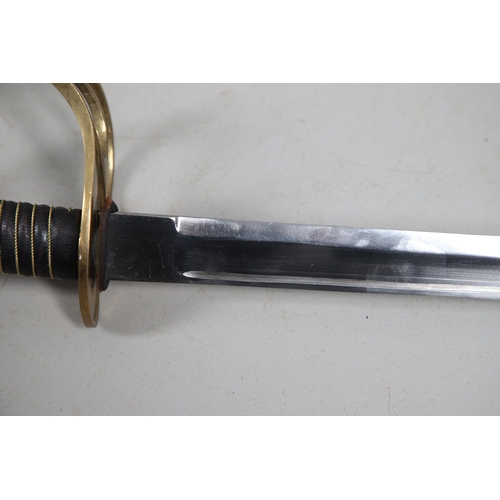 119 - A FRENCH THREE BAR HILT SWORD AND SCABBARD. The 85 cm tapering, pointed blade with broad and shallow... 