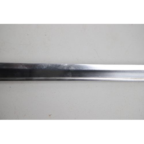 119 - A FRENCH THREE BAR HILT SWORD AND SCABBARD. The 85 cm tapering, pointed blade with broad and shallow... 