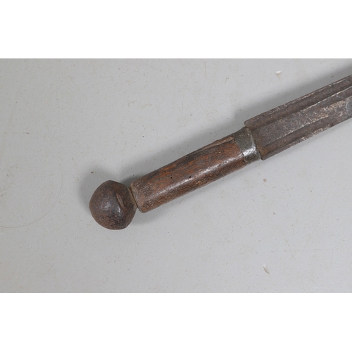 120 - AN 18TH CENTURY SWORD BLADE IN AN ASSOCIATED GRIP. The 64 cm pointed blade with double shallow fulle... 