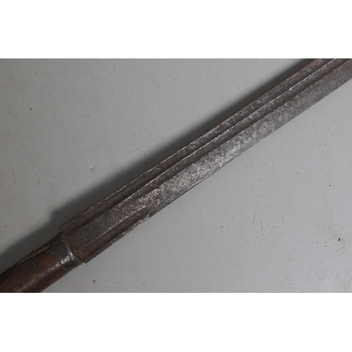 120 - AN 18TH CENTURY SWORD BLADE IN AN ASSOCIATED GRIP. The 64 cm pointed blade with double shallow fulle... 
