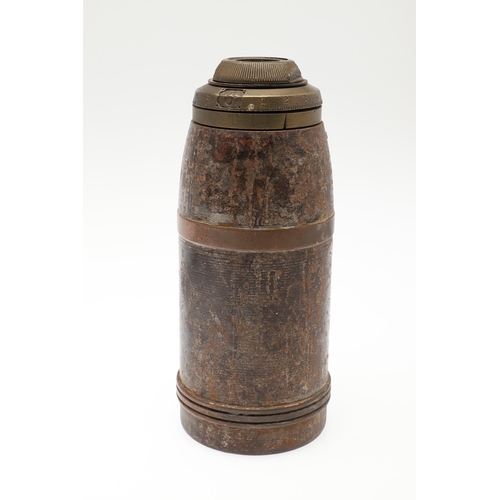 A SHRAPNEL MORTAR SHELL ON CARRIAGE MOUNT. A mortar shell 7cm wide x 18 ...