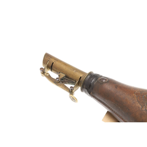 61 - TWO LEATHER BODIED SHOT FLASKS. A leather bodied shot flask decorated with game in a wooded landscap... 