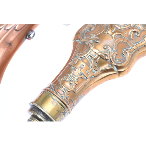 62 - A COPPER BODIED POWDER FLASK BY JAMES DIXON AND SONS AND TWO OTHERS. A powder flask with plated moun... 