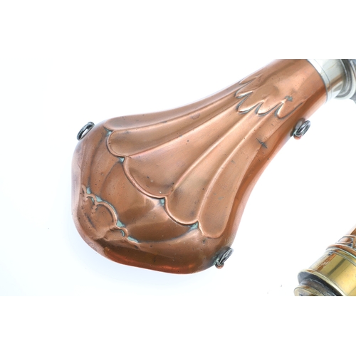62 - A COPPER BODIED POWDER FLASK BY JAMES DIXON AND SONS AND TWO OTHERS. A powder flask with plated moun... 