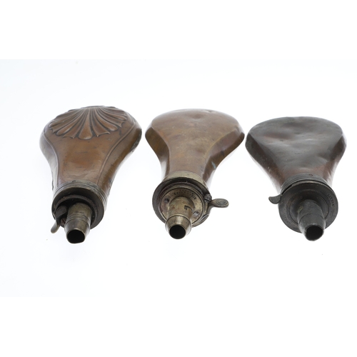 66 - A COLLECTION OF FIVE COPPER BODIED POWDER FLASKS. A mixed collection of copper bodied powder flasks ... 