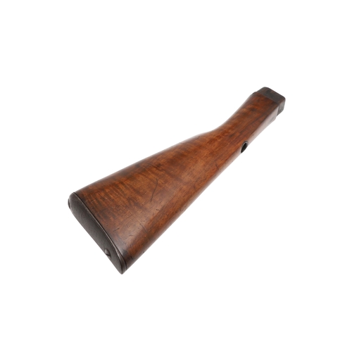 71 - A WALNUT RIFLE STOCK. A stock for a rifle with steel butt plate and small circular depression to the... 